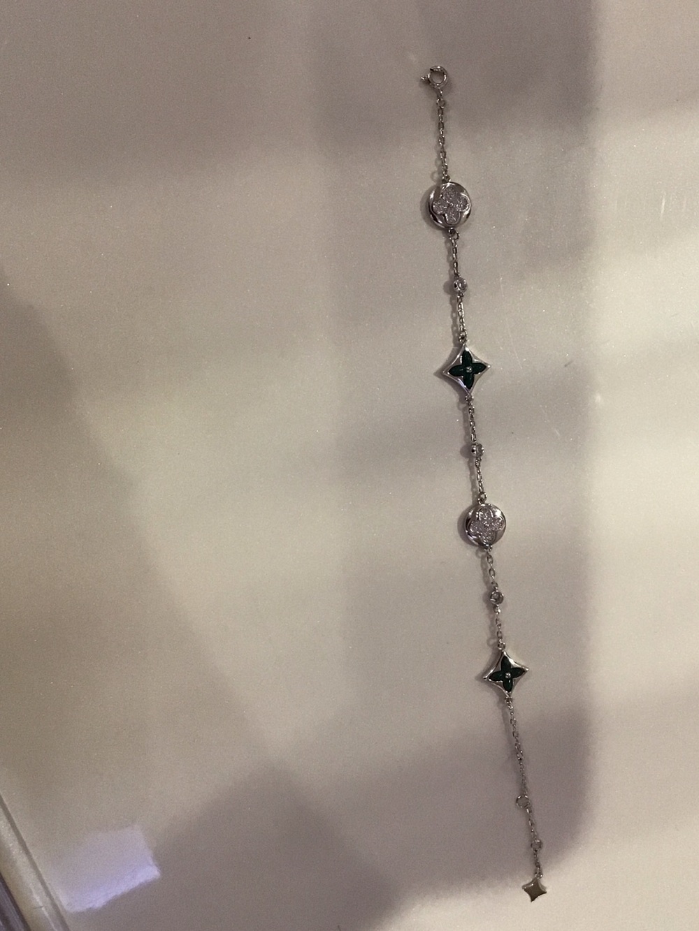 Silver Chain Bracelet with Green Star Accents